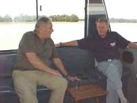 MEC JA Fraser, Depute First Grand Principal, and MEC D Thompson, Past Depute Grand Superintendent, enjoying a cruise on a Barge on the Vaaldam.